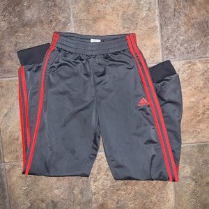 Gray Adidas sweats with orange stripes